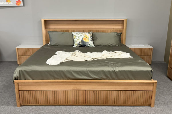 Elevate your bedroom with the Ashton Bed. Crafted from premium Messmate Timber, featuring LED lights, USB ports, and storage. Available in Queen and King sizes.