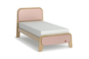 Children's bed with pink and beige design on a white background