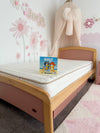 Eco Kids Mattress pictured on a Cherry and Almond coloured Boori Bronte Bed frame
