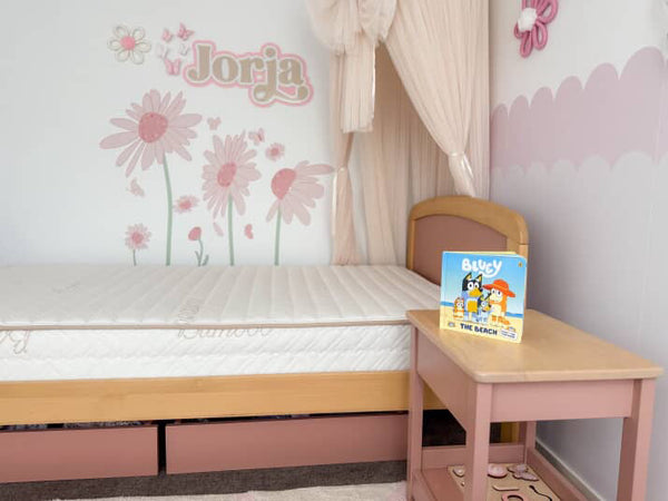 Eco Kids Mattress pictured on a Cherry and Almond coloured Boori Bronte Bed frame