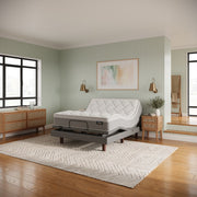 Sealy Mattress on a stand in a bedroom with wooden flooring and light green walls. Available at Best in Beds in Sydney showrooms in Prospect, Campbelltown and Warrawong