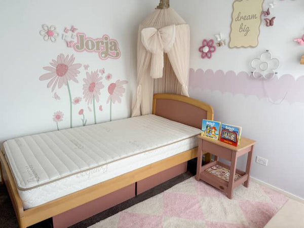 Eco Kids Mattress pictured on a Cherry and Almond coloured Boori Bronte Bed frame