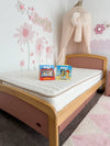 Eco Kids Mattress pictured on a Cherry and Almond coloured Boori Bronte Bed frame