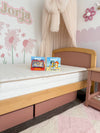 Eco Kids Mattress pictured on a Cherry and Almond coloured Boori Bronte Bed frame