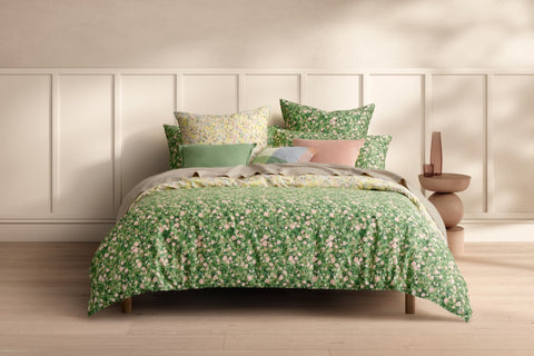 Inez Quilt Cover Set, you've happened across a wonderland of wildflowers. Fully reversible in two striking spring shades, each side is patterned with small scale florals. Find new buds in brilliant colours each time Printed cotton percale reversible small scale floral print Striking spring colourway Style multiple ways