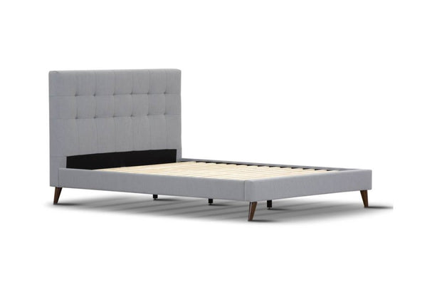 The Jackson Upholstered Bed is a luxurious and modern piece for your bedroom. It is crafted with a sleek tufted headboard upholstered in premium polyester fabric and dark chocolate legs. The low end foot and top selling design make for a great value. This bed comes in two colors, light grey or charcoal. - Mattress not included