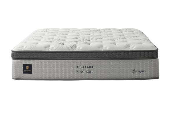 Gray mattress with King Koil Lexington Plush branding on a white background