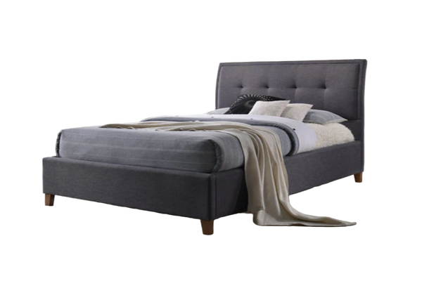 DarkGrey queen size upholstered fabric bed with plaid blanket and pillows on a white background