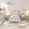 Children's bedroom with a bed, nightstands, and decorative items.