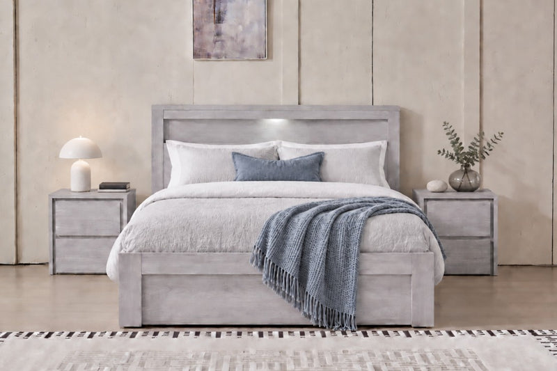Belleville Queen side gas lift bed in Cement Grey with raised storage platform and open end drawer