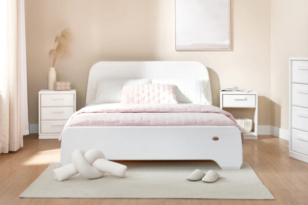 Features a simple rounded silhouette, paired with a brushed white finish that highlight the natural Australian pine timber grain. Finished in a brushed white colour. Made out of sustainably sourced Queensland plantation Australian Araucaria timber. Headboard can be installed at two different height levels