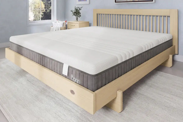 Boori Lux King Pocket Spring Mattress on a light timber Boori King bed frame, showing the reinforced side panel with Boori branding
