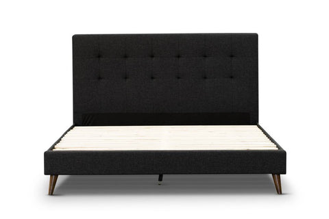 The Jackson Upholstered Bed is a luxurious and modern piece for your bedroom. It is crafted with a sleek tufted headboard upholstered in premium polyester fabric and dark chocolate legs.  The low end foot and top selling design make for a great value. This bed comes in two colors, light grey or charcoal.