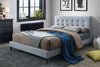 The Jackson Upholstered Bed is a luxurious and modern piece for your bedroom. It is crafted with a sleek tufted headboard upholstered in premium polyester fabric and dark chocolate legs. The low end foot and top selling design make for a great value. This bed comes in two colors, light grey or charcoal. - Mattress not included