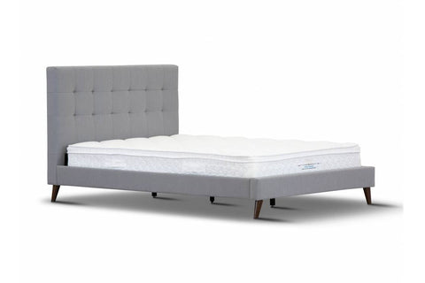 The Jackson Upholstered Bed is a luxurious and modern piece for your bedroom. It is crafted with a sleek tufted headboard upholstered in premium polyester fabric and dark chocolate legs. The low end foot and top selling design make for a great value. This bed comes in two colors, light grey or charcoal. - Mattress not included