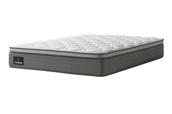 King Koil Plush Abelia Reflex Plus Pillow Top Mattress with white top quilting and a grey border fabric