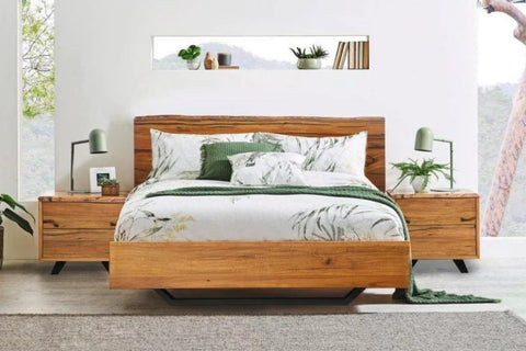 The Messina Bed is crafted from solid Western Australian Marri hardwood timber, in a unique floating design. Its robust construction ensures durability while its minimalist design adds a contemporary flair to any bedroom. Make a statement with this timeless classic. Complete the look with bedside tables, tallboy che..