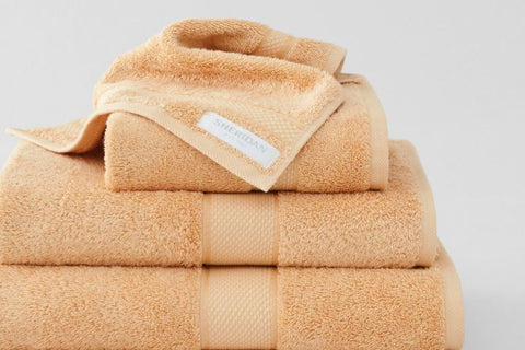 Luxury Egyptian Rockmelon Orange Colour - Australia-wide FREE Delivery on Manchester; Sheridan's Luxury Egyptian towel collection is crafted from the finest, combed ring-spun, certified Egyptian cotton pile, making it long-lasting with a beautifully soft hand feel; a staple for any bathroom lover; greater absorption whilst remaining luxuriously soft to touch;