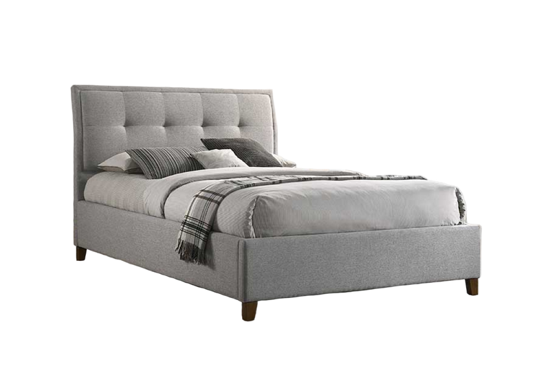 Light Grey queen size upholstered fabric bed with plaid blanket and pillows on a white background