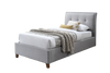 Light Grey king single size upholstered fabric bed with white bedding and decorative pillows in a modern bedroom.