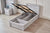 Belleville King Single front gas lift bed in Cement Grey with the mattress platform raised