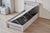Belleville King Single side board gas lift bed in Cement Grey with the mattress platform raised
