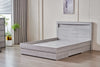 Angled view of Belleville Queen bed frame with foot-end and side storage drawers open