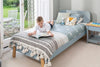 Boori Natty king single kids bed in barley white and oak with child reading in bright bedroom, Best in Beds Campbelltown Sydney
