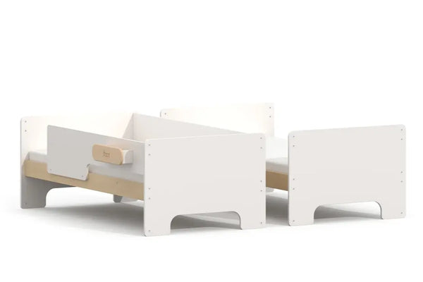 Boori Neat Single Bunk Bed split into two single beds in White and Natural Timber - one guarded single, one open single, showing the two-bed conversion mode.