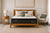 Morrison Peaceful mattress front view on timber bed frame - pillow top medium-feel mattress available at Best in Beds Campbelltown and online
