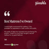 Product review of a Yinahla Classic Comfort mattress on a dark red background. "The Best Mattress Ive Owned"