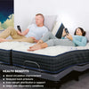 man and woman lying on a true motion adjustable bed base smart bed grey